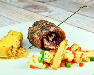 Grilled Sirloin Steak farofa crusted cauliflower and potato gratin with pimento tomato sauce